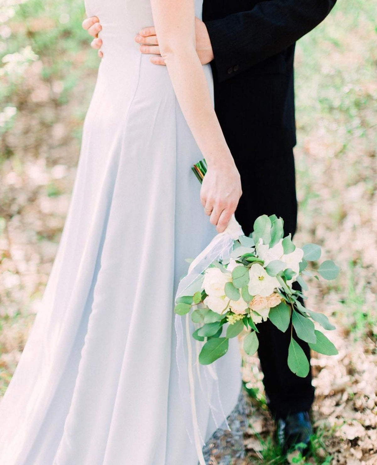 a man and a woman standing next to each other