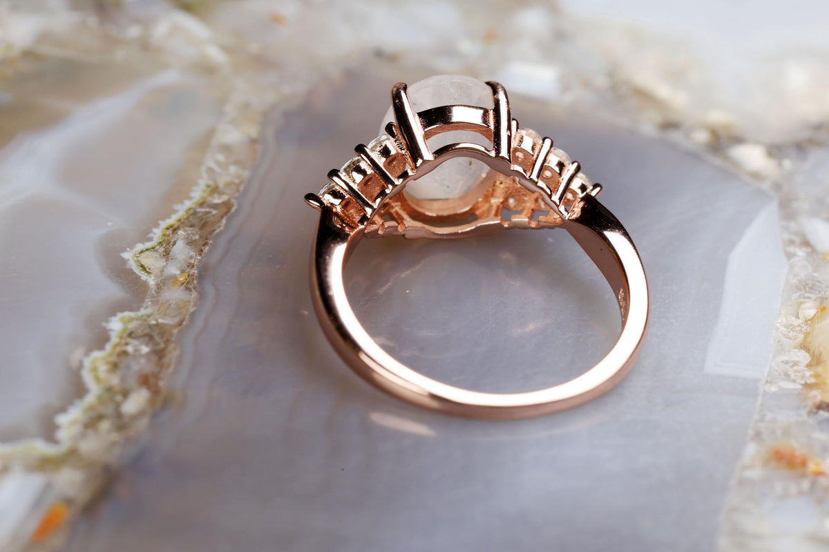 a close up of a ring on a rock