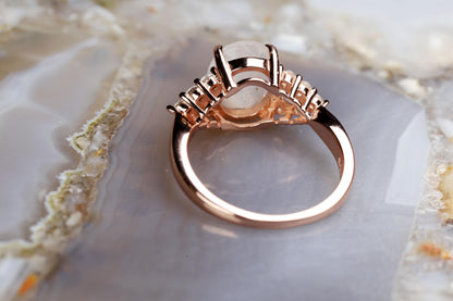 a close up of a ring on a rock