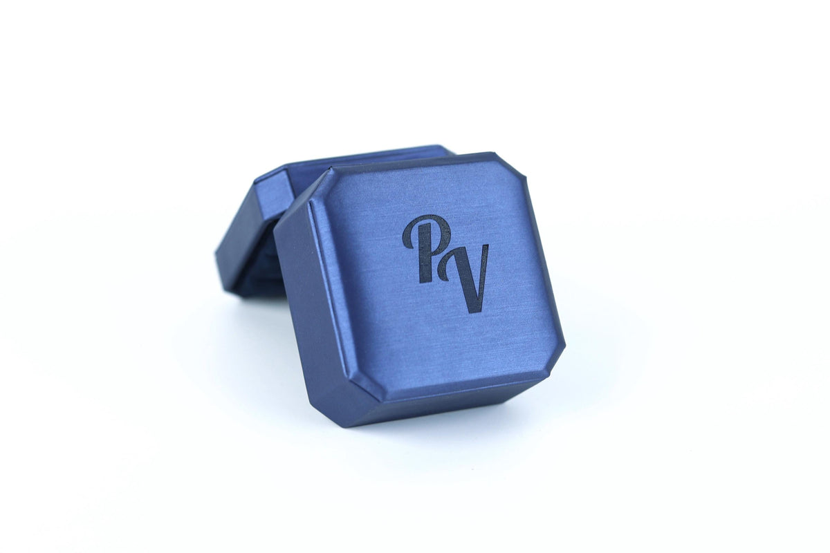 A blue rectangular box with a logo on it.