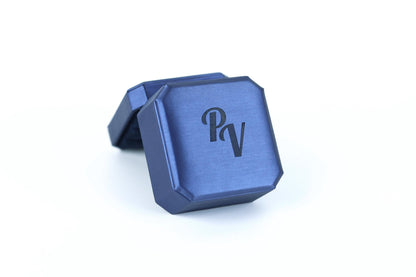 A blue rectangular box with a logo on it.