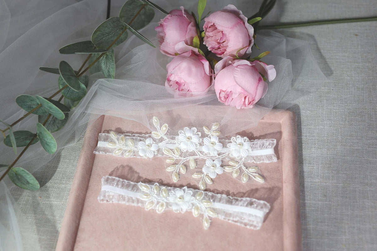 a bouquet of pink roses sitting on top of a table