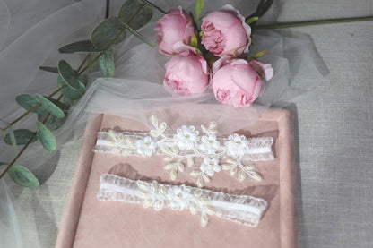 a bouquet of pink roses sitting on top of a table