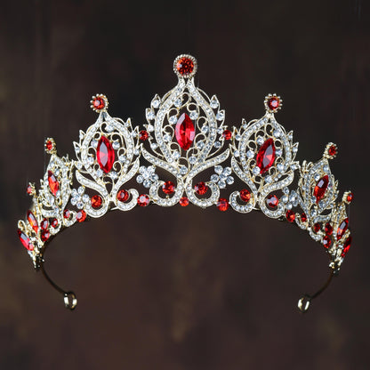 a tiara with red and white stones on it