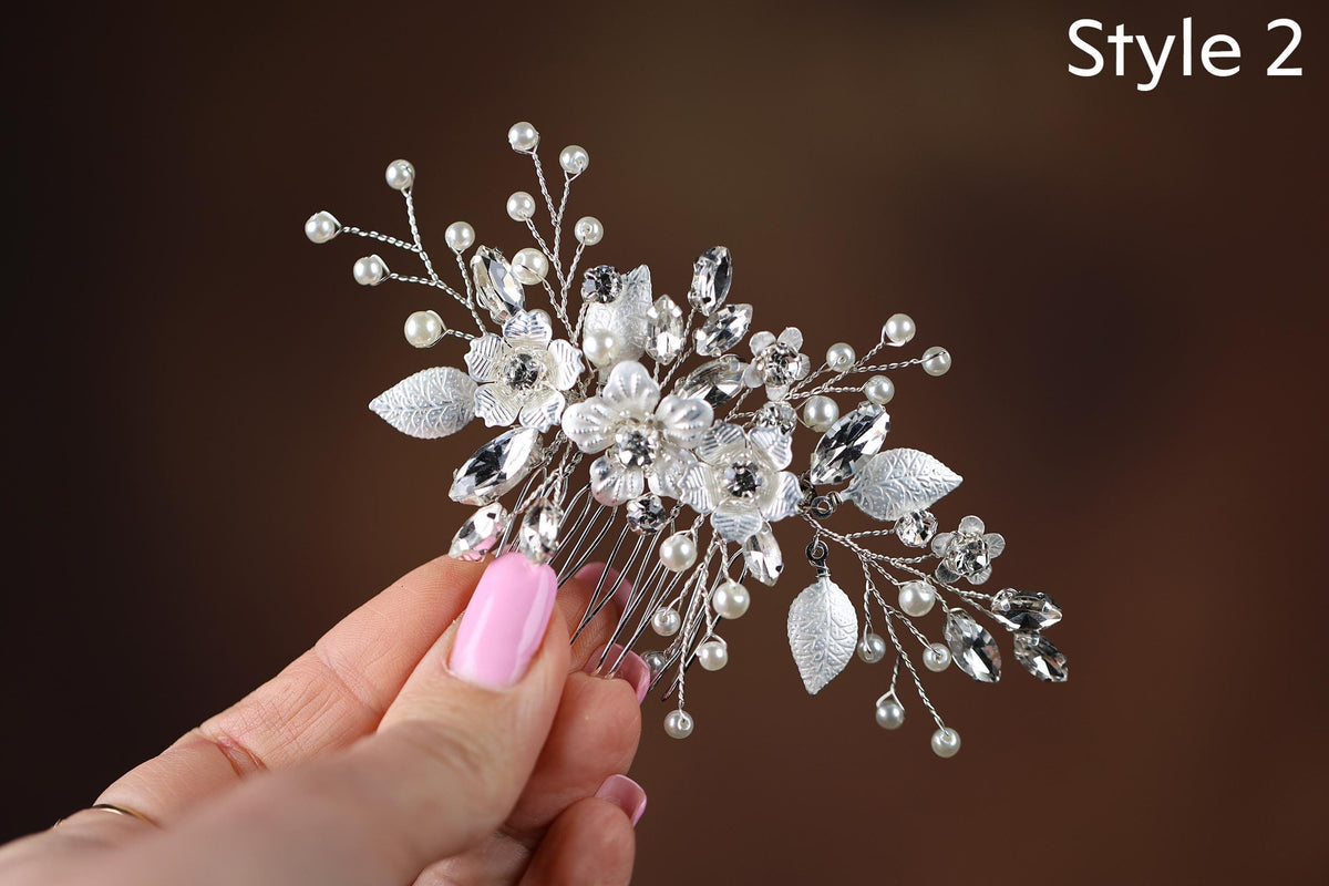 a woman is holding a hair comb in her hand