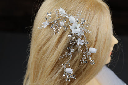 a close up of a woman's head wearing a hair comb