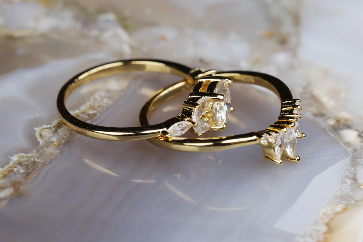 a couple of rings sitting on top of a table
