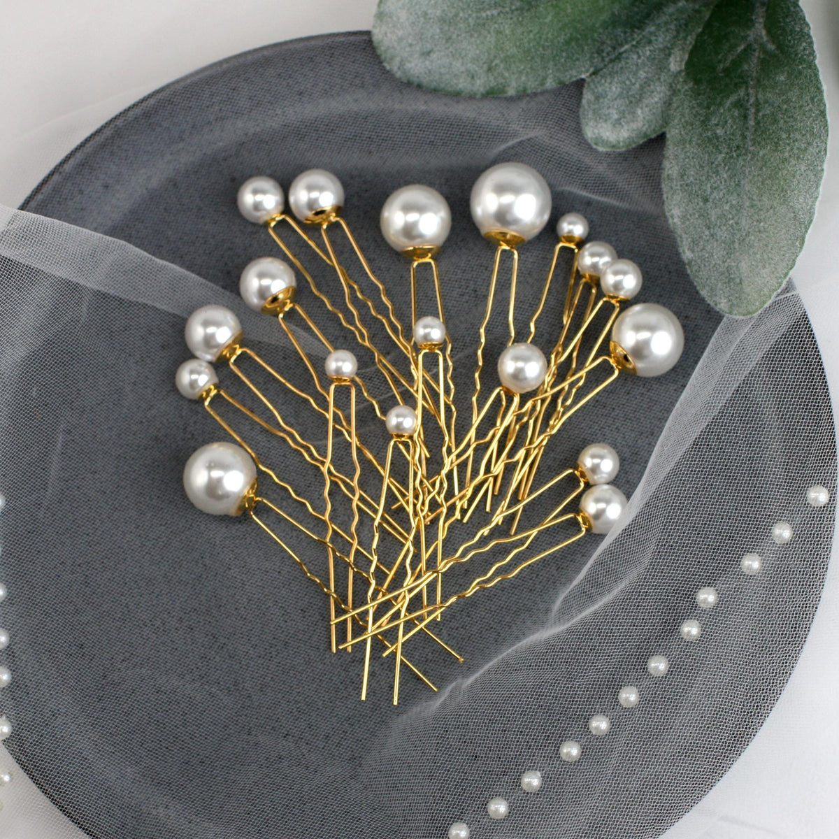 a bunch of pins sitting on top of a plate