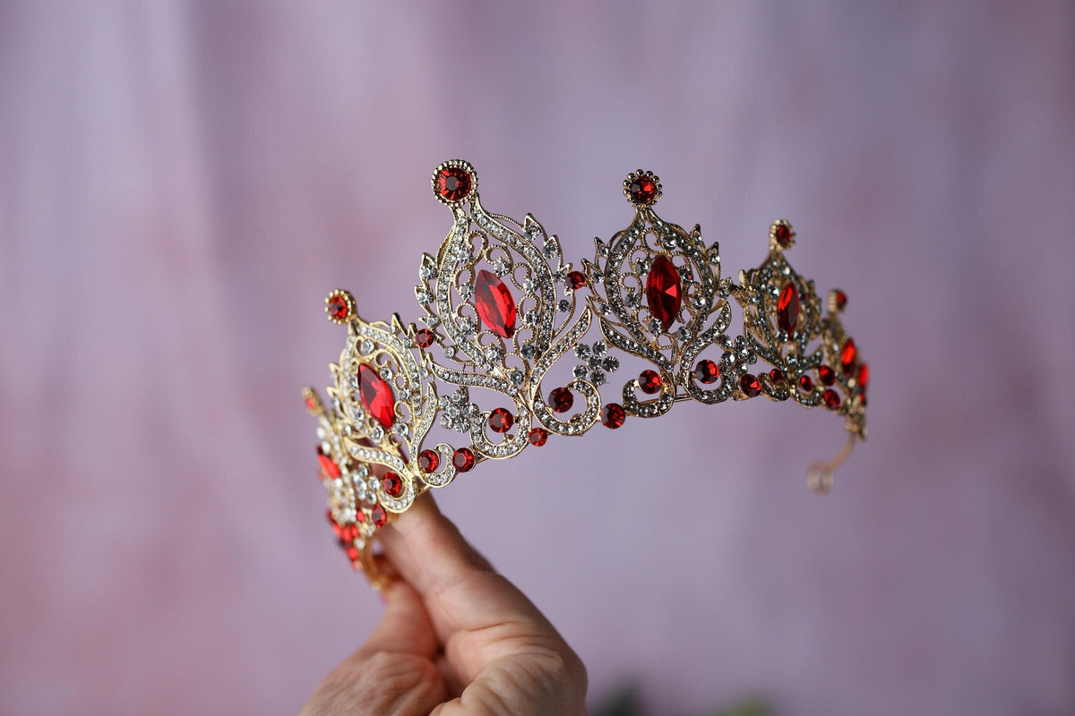 a crown sitting on top of a tree stump