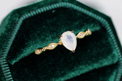 a close up of a ring in a velvet case