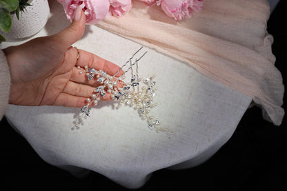a woman is holding a bunch of beads