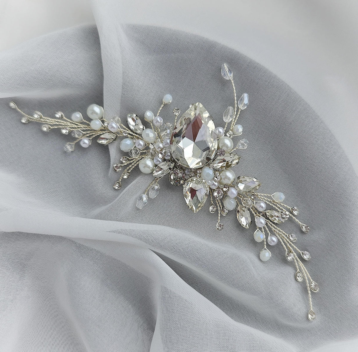a close up of a piece of cloth with a brooch