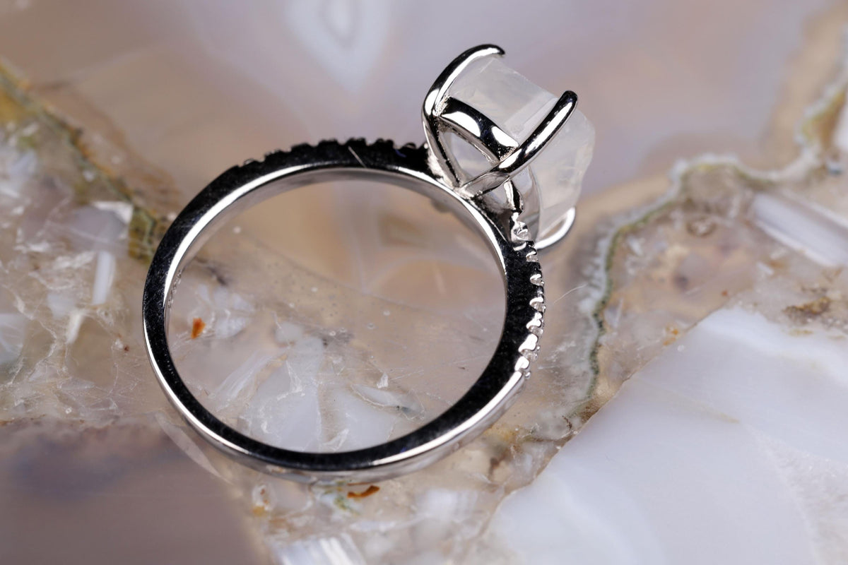 a close up of a ring on a rock