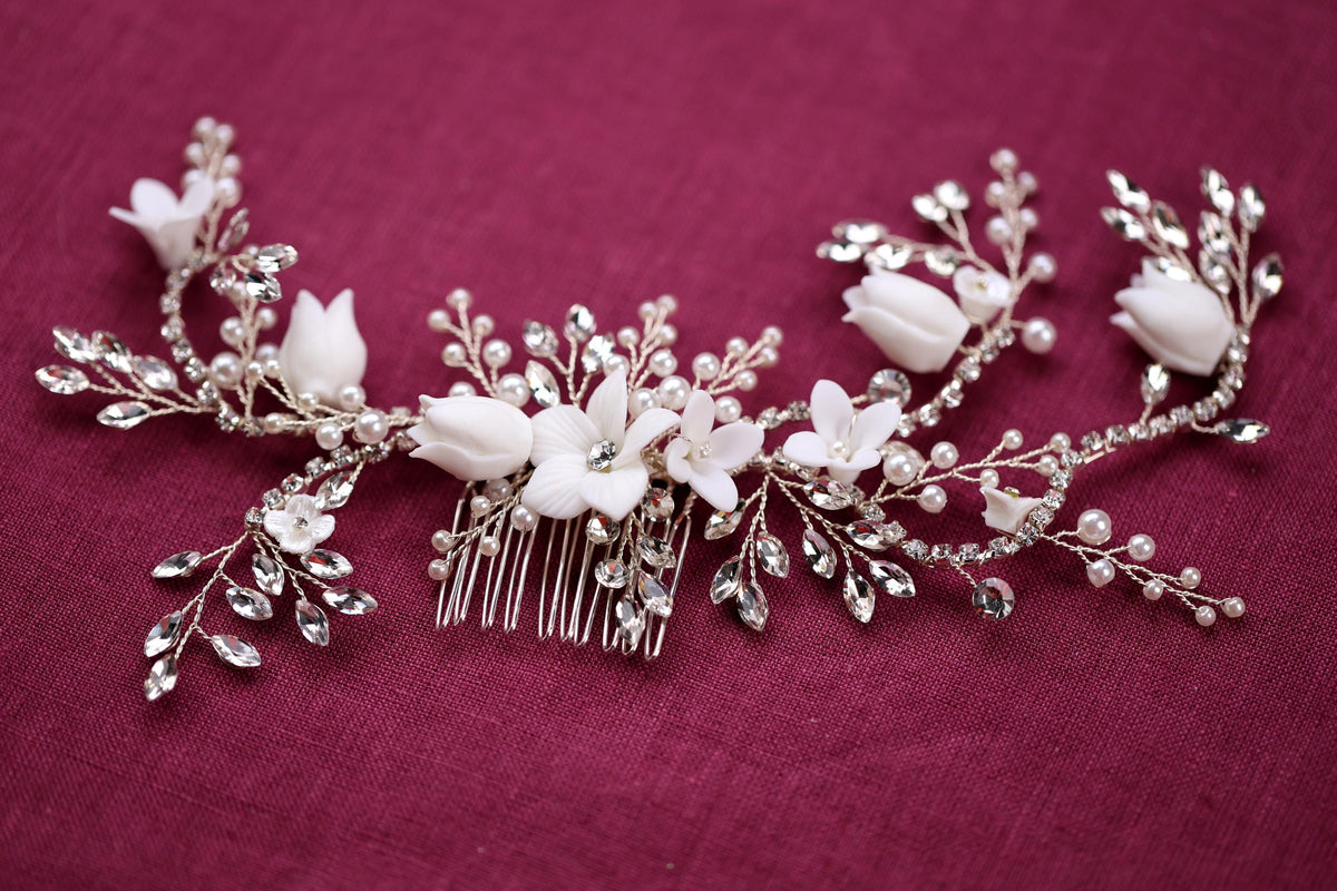a bridal hair comb with flowers and leaves