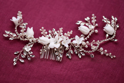 a bridal hair comb with flowers and leaves