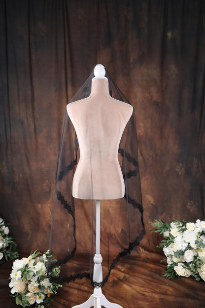 a mannequin with a veil on top of it