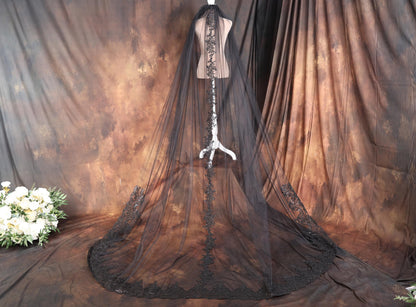 a mannequin dressed in a wedding dress with a veil