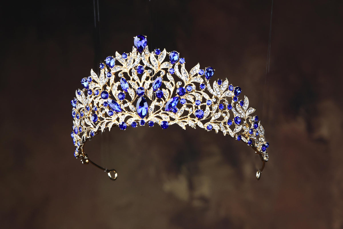 a blue and white tiara hanging from a ceiling
