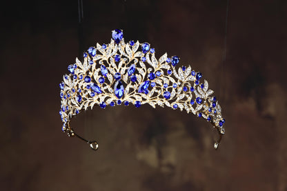 a blue and white tiara hanging from a ceiling