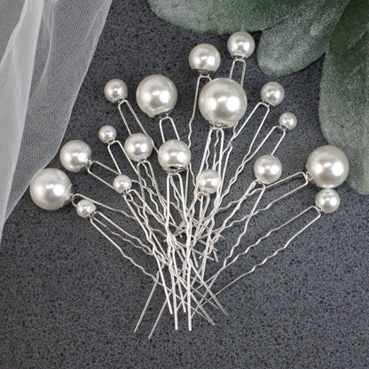 a bunch of pins sitting on top of a table