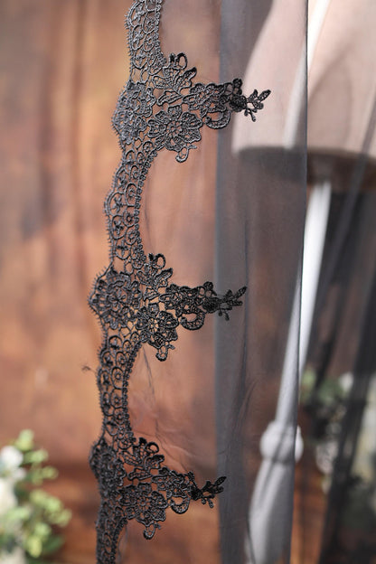 a close up of a piece of black lace