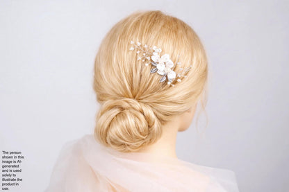 A close-up view of a woman's blonde hair with a decorative hair accessory, such as a flower or crystal piece, pinned to the side.