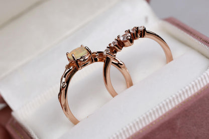 a couple of rings sitting inside of a box