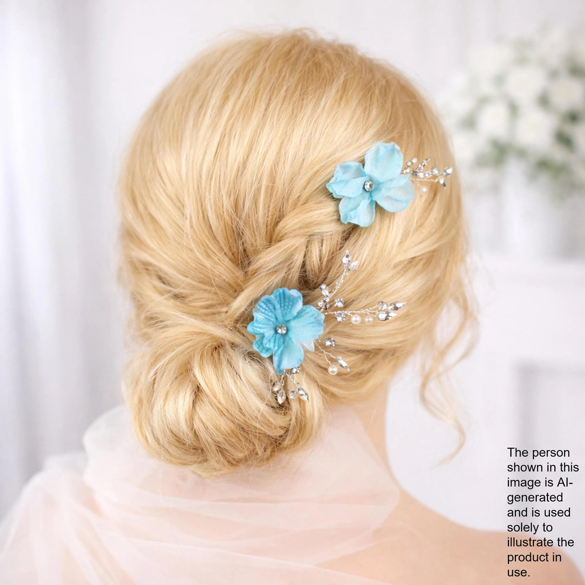 A woman with blonde hair styled in a bun, wearing blue flower hair clips.