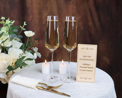 a table topped with two glasses of wine