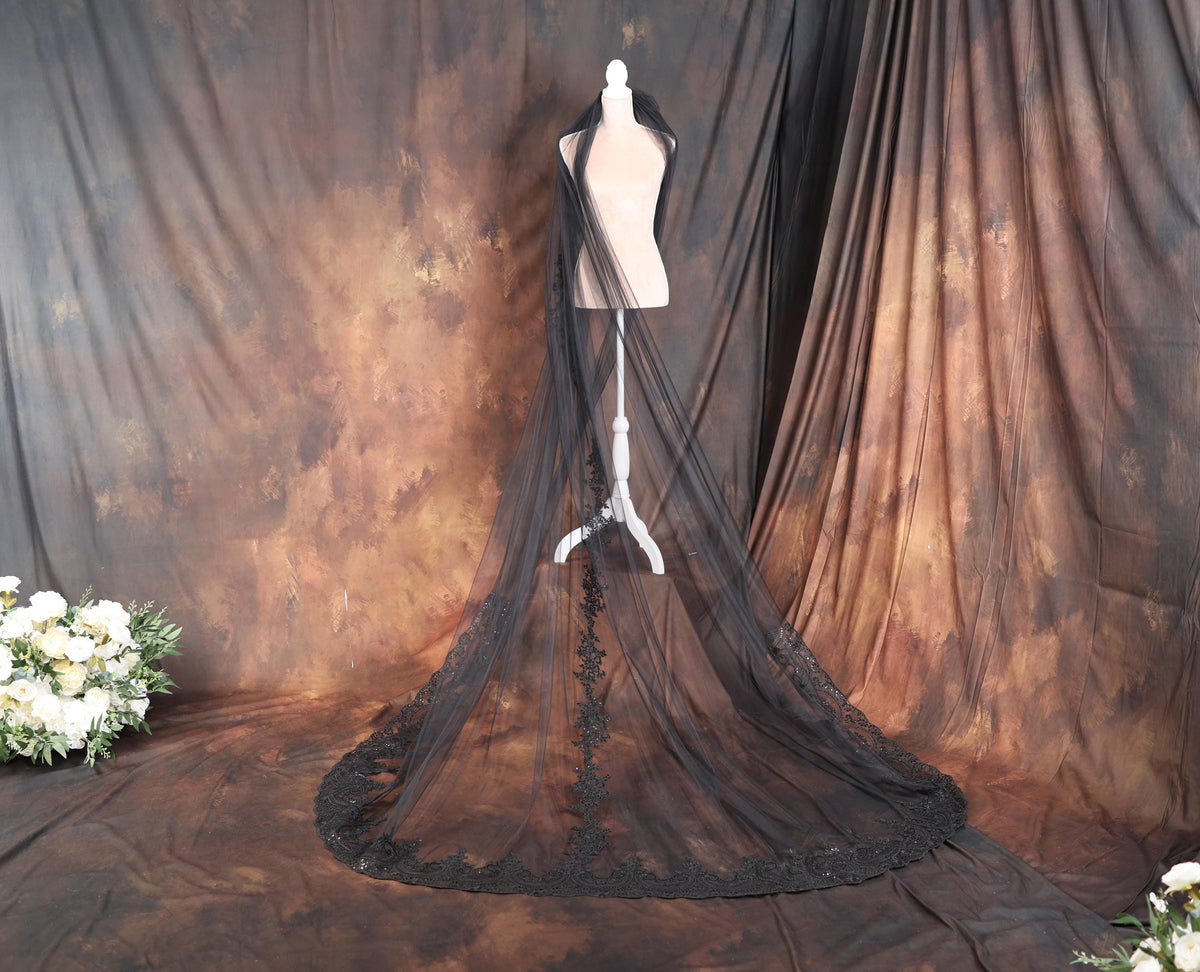 a dress on a mannequin in front of a backdrop