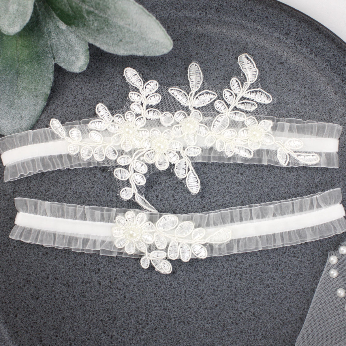 a couple of headbands sitting on top of a plate