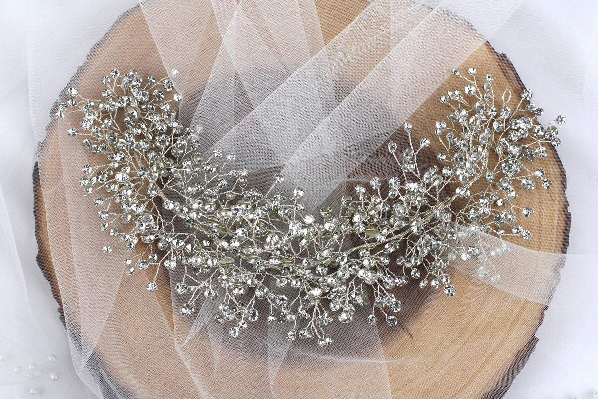 a bridal tiara on a piece of wood