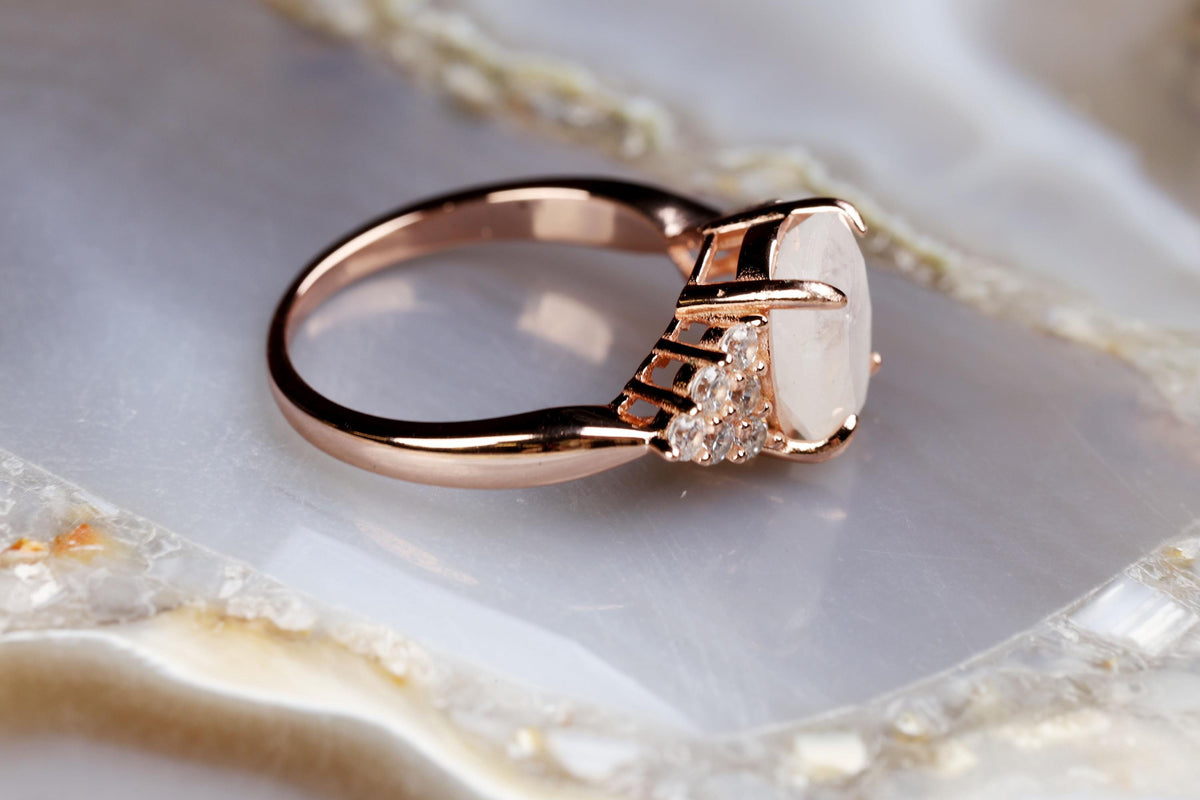 a close up of a ring on a marble surface