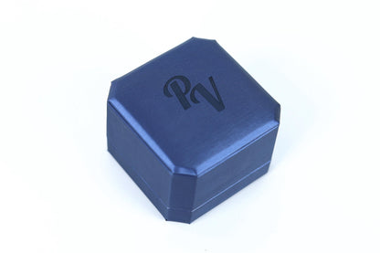 A blue, square-shaped jewelry box with a logo on it.