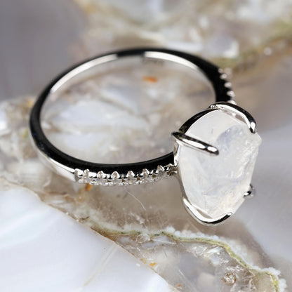 a close up of a ring on a rock