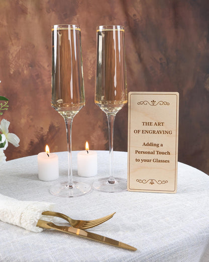 a couple of wine glasses sitting on top of a table