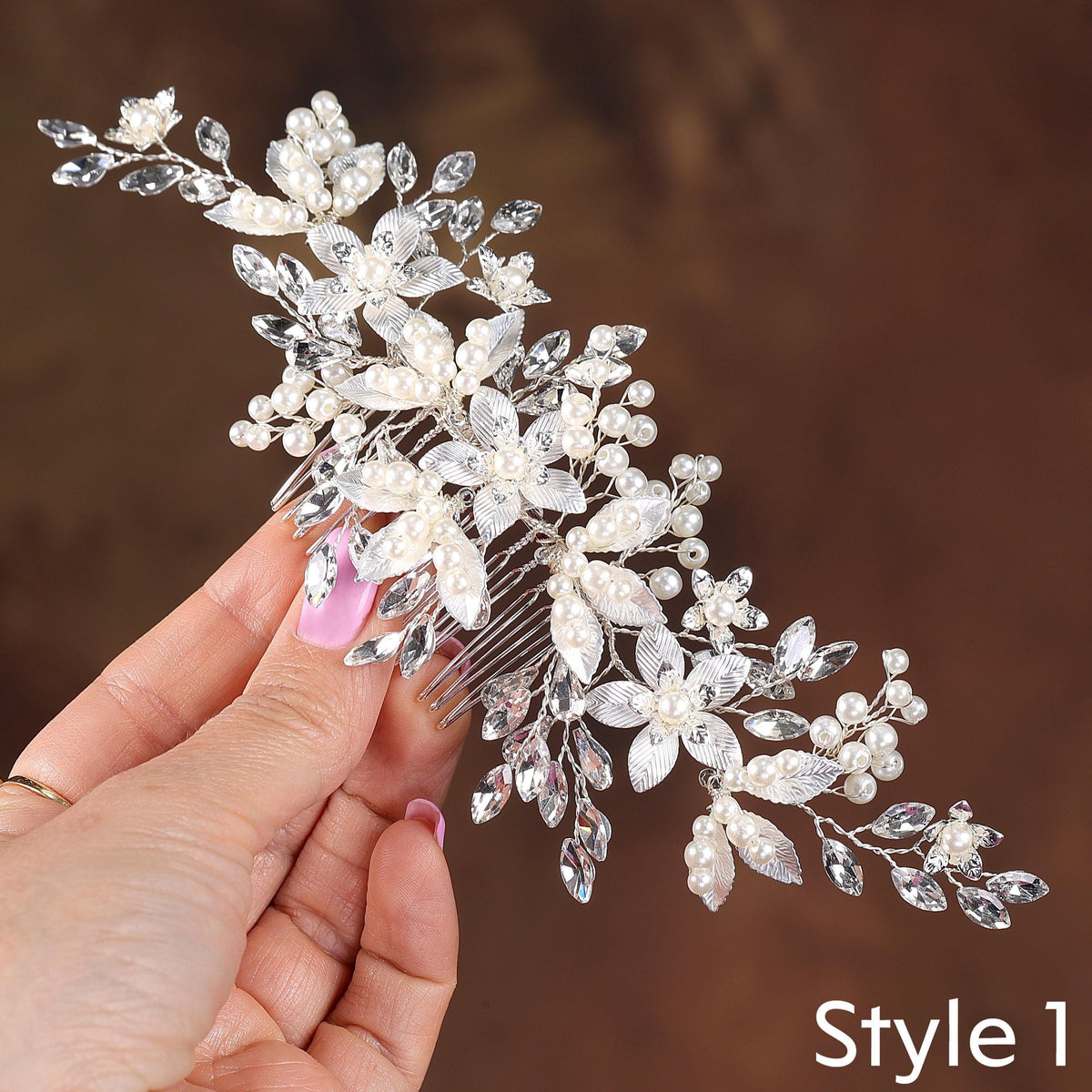 a bridal hair comb with pearls and crystals