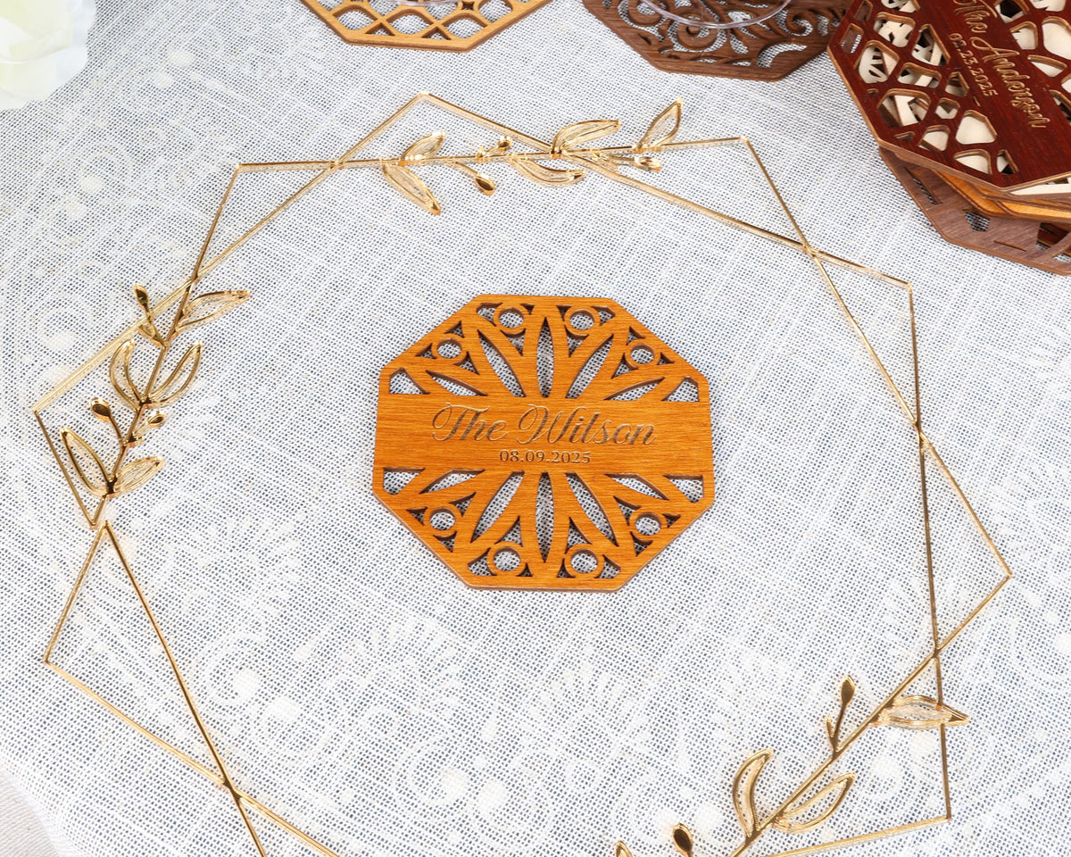 a wooden plaque with a name on it sitting on a table