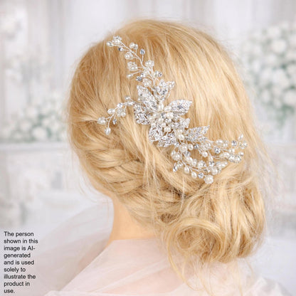 A close-up of a woman's blonde hair with a decorative hair accessory, possibly a veil or headband, in the background.