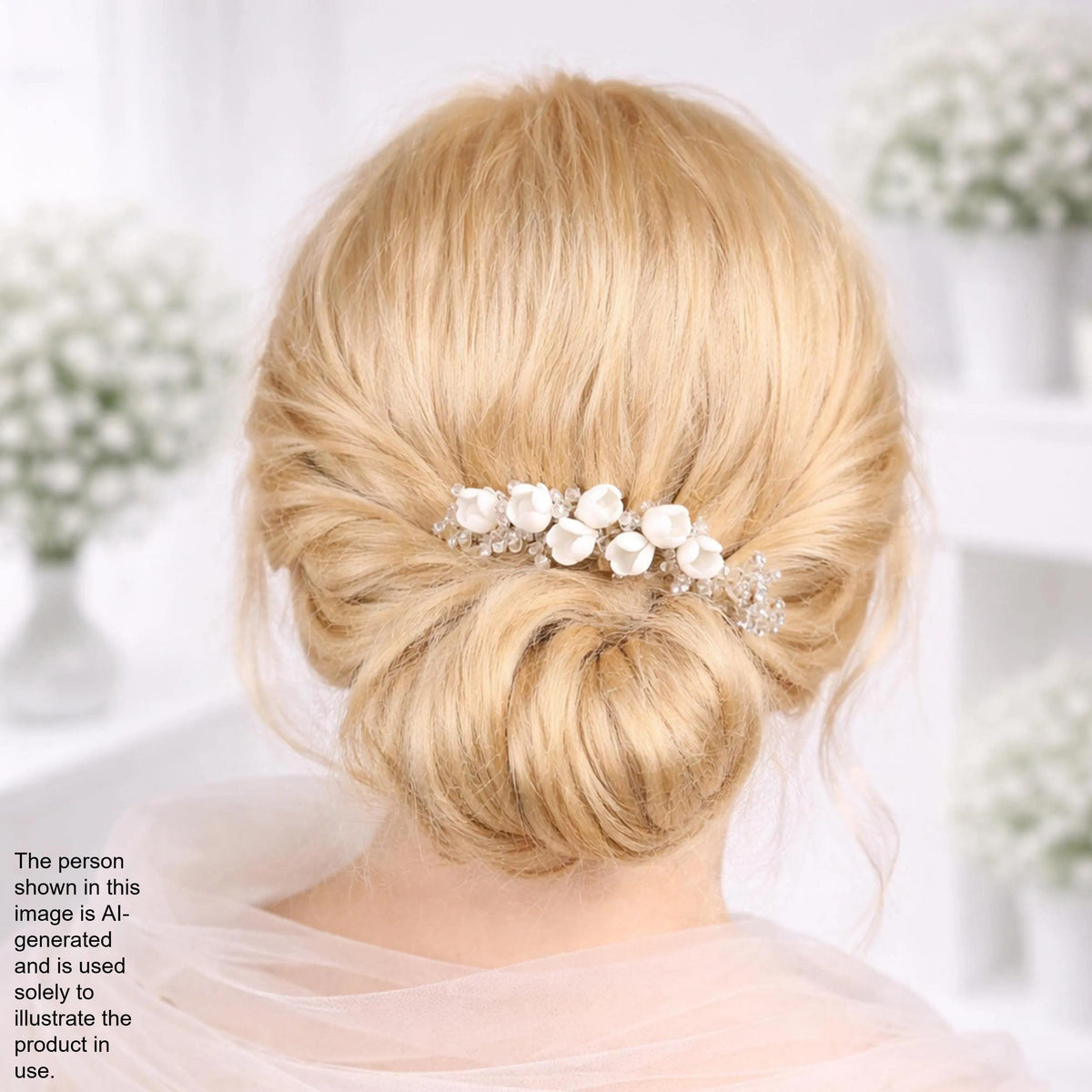 the back view of a woman's blonde hair with a decorative hair accessory, such as a flower or crystal piece, pinned in a bun.