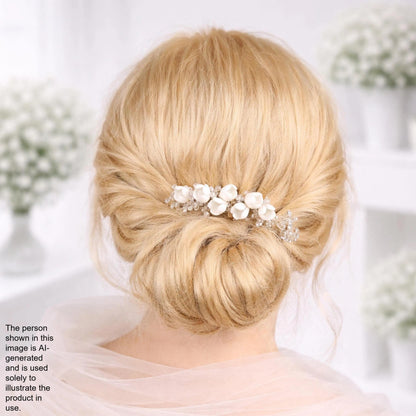 the back view of a woman's blonde hair with a decorative hair accessory, such as a flower or crystal piece, pinned in a bun.
