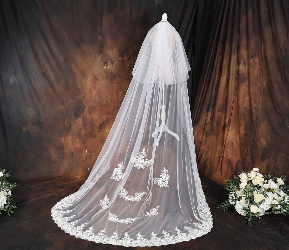 a wedding veil with flowers on a table