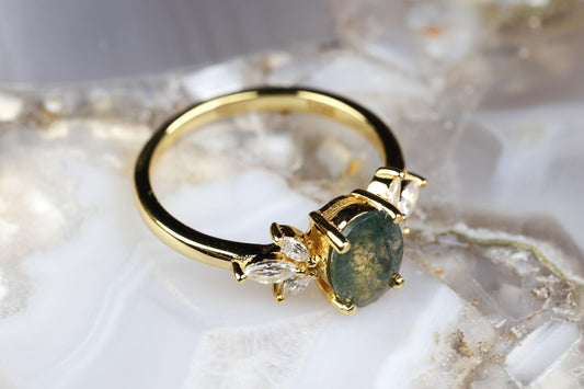 a close up of a ring with a stone