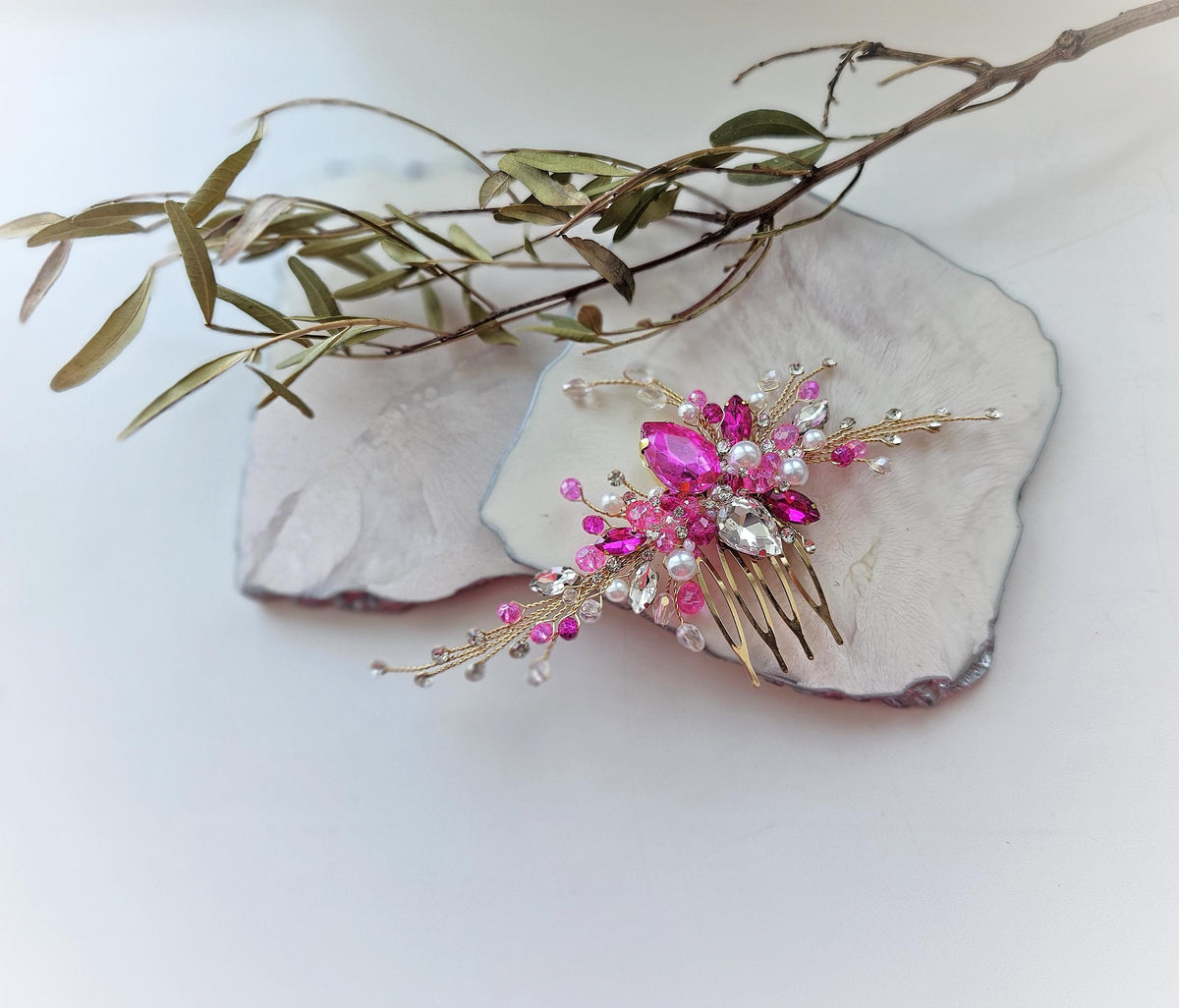 a close up of a hair comb with flowers on it