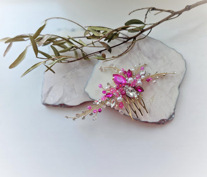 a close up of a hair comb with flowers on it