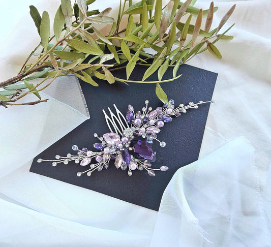 a hair comb with a bunch of flowers on top of it