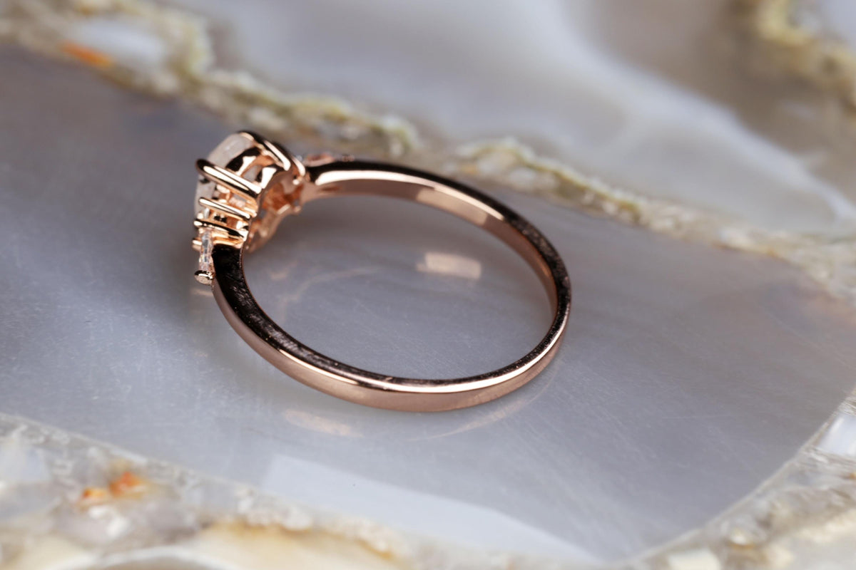 a close up of a ring on a marble surface