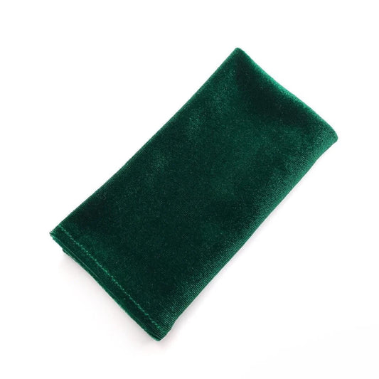 A rectangular green napkin is shown against a white background.