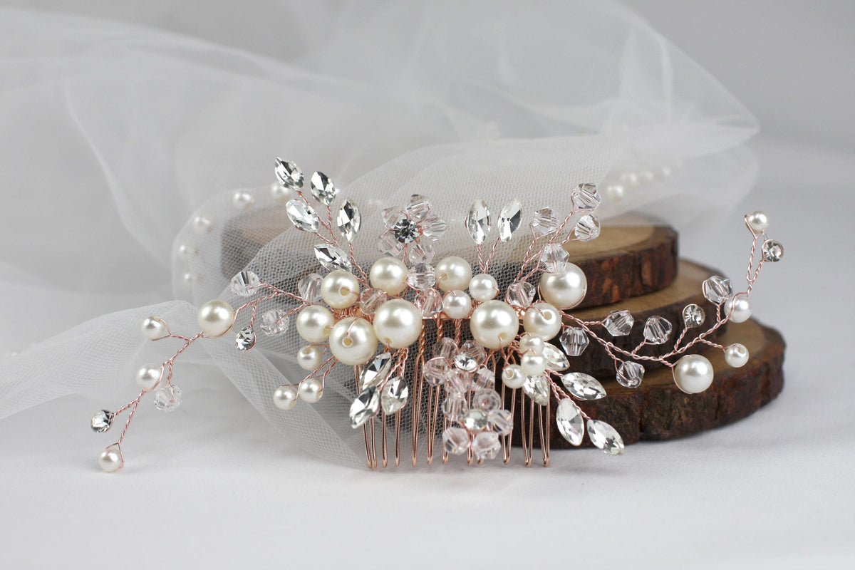 a close up of a hair comb with pearls