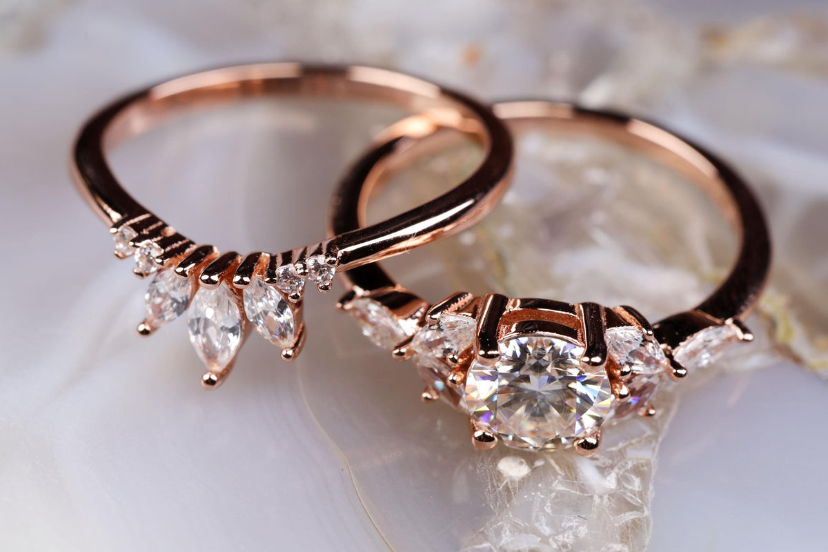 a couple of rings sitting on top of a table